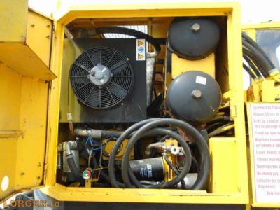 Excavator pe pneuri Geismar KGT-V pentru cale ferata