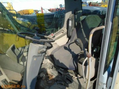 Excavator pe pneuri New Holland MH 5.6