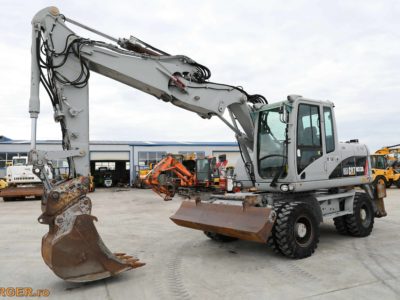 Excavator pe pneuri Caterpillar M313D - 2009