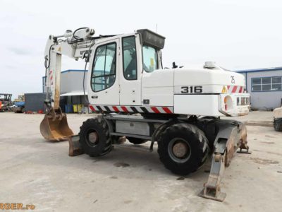 Excavator pe pneuri Liebherr A316 Litronic